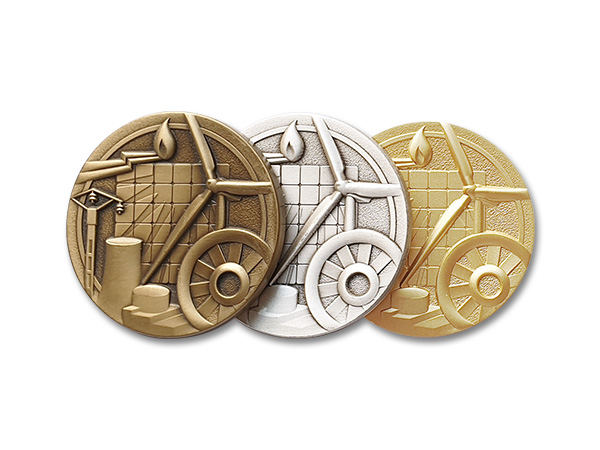 médaille sur-mesure teinte bronze, argentée ou dorée